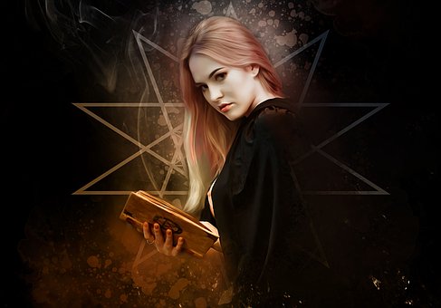 Woman holding a magic book.